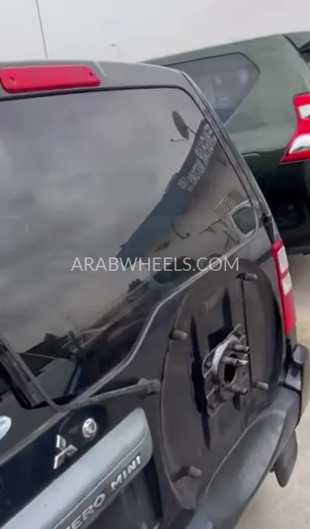 Mitsubishi Pajero Mini 2004 for Sale in Dubai Image-13